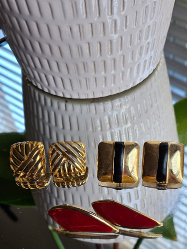 Three Gold Earrings with gold finish.