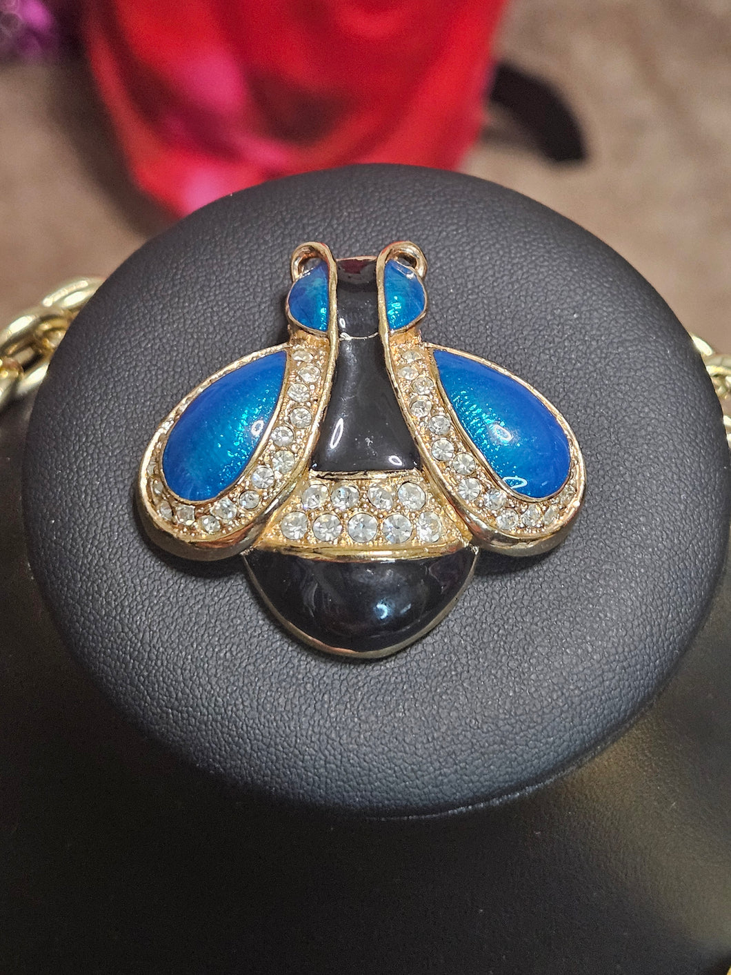 Blue black brooch